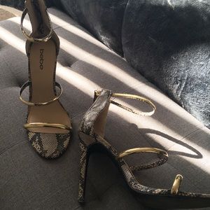 BEBE Snake heels Gold straps Sexy Glamorous Size 9